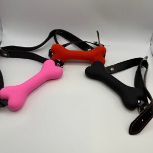 Textured bone-shaped silicone gag with adjustable buckle strap in red, pink, and black