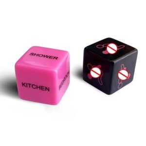 A pair of black and pink erotic dice with engraved action words and body parts, designed for spontaneous couples' play.