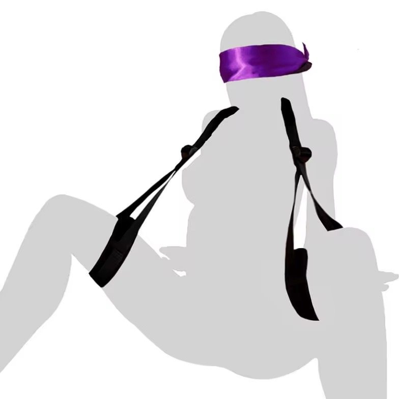 A 6-point wearable body restraint system featuring adjustable black straps and purple padded cuffs for the neck, wrists, thighs, and ankles.