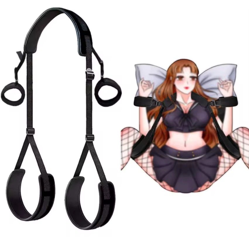 A 6-point wearable body restraint system featuring adjustable black straps and purple padded cuffs for the neck, wrists, thighs, and ankles.