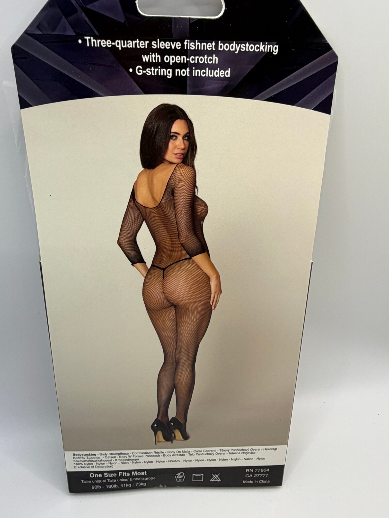 Dreamgirl Style 0015 black fishnet bodystocking featuring three-quarter sleeves and an open crotch design for a provocative look