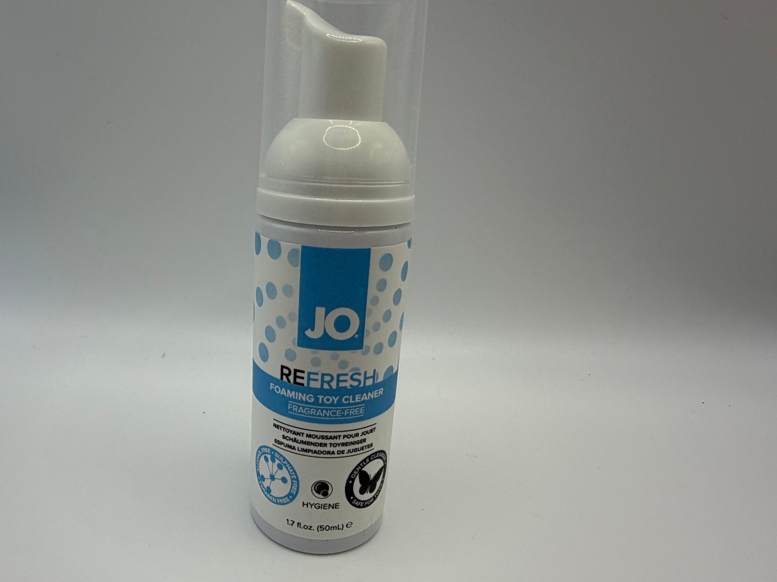 System JO Refresh fragrance-free foaming toy cleaner in a 1.7 fl oz pump bottle, showing alcohol and paraben-free labels.